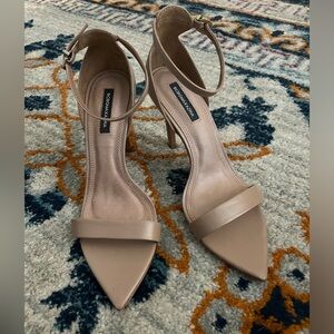 BCBGMAXAZRIA Women's Demia Ankle
Strap Heel Palomino